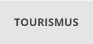 Tourismus Ein Button mit der Aufschrift Tourismus.