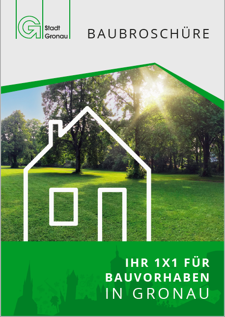 Silhouette eines Hauses vor einem grünen Garten