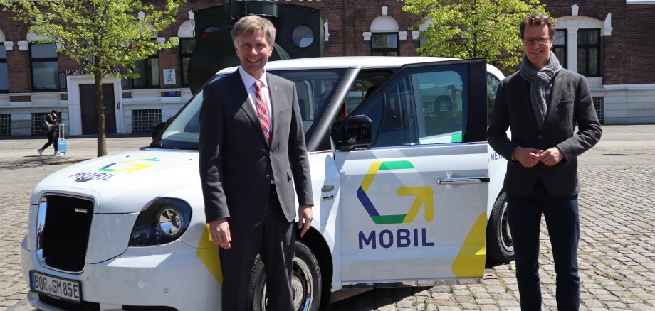 Bürgermeister Rainer Doetkotte und Verkehrsminister Hendrik Wüst.