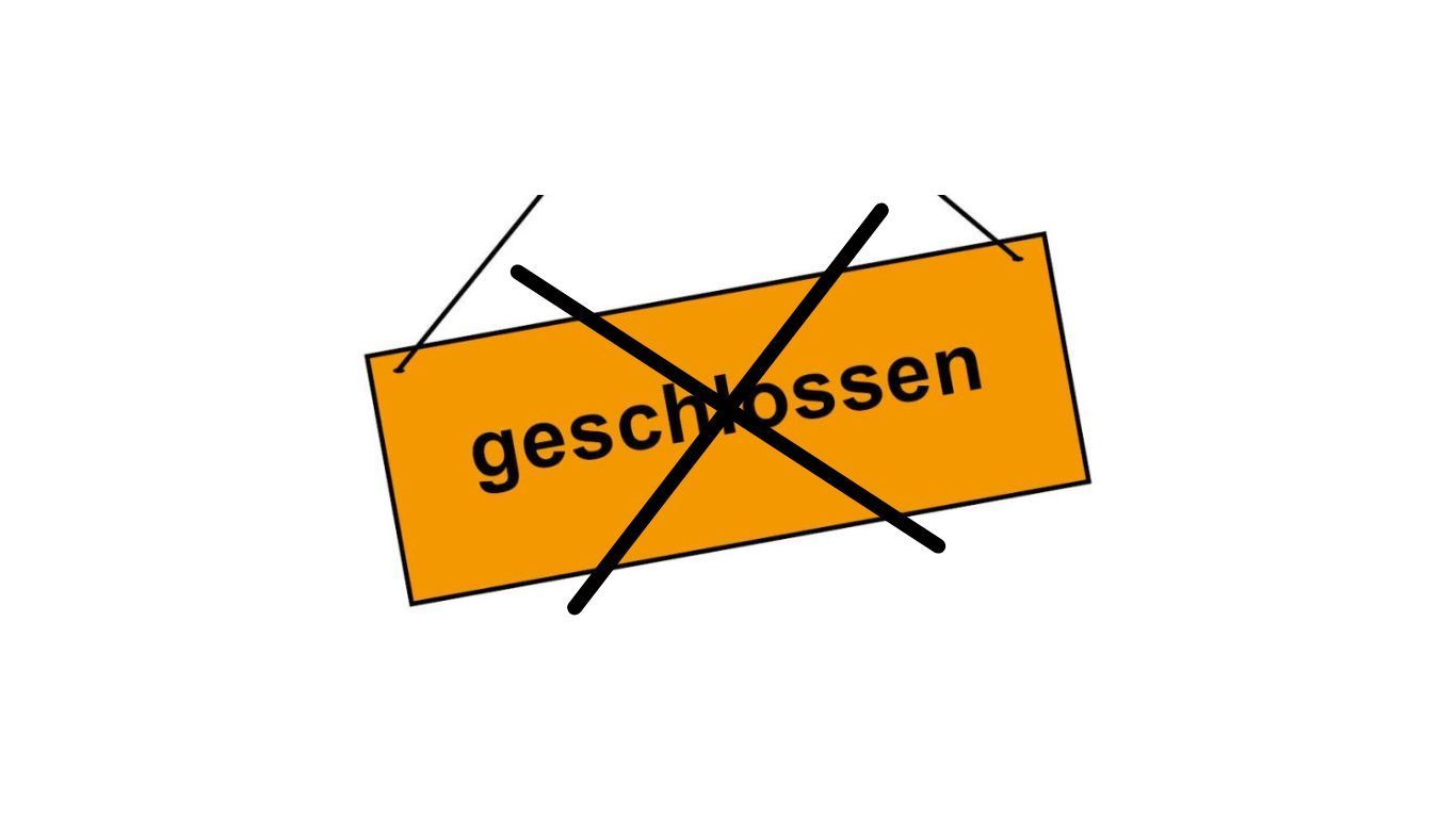 Ein Schild mit der Aufschrift geschlossen, was durchgestrichen ist